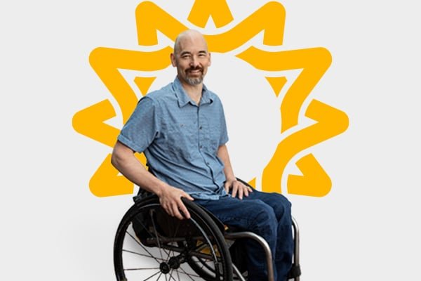 Man smiling in wheelchair Man smiling in wheelchair